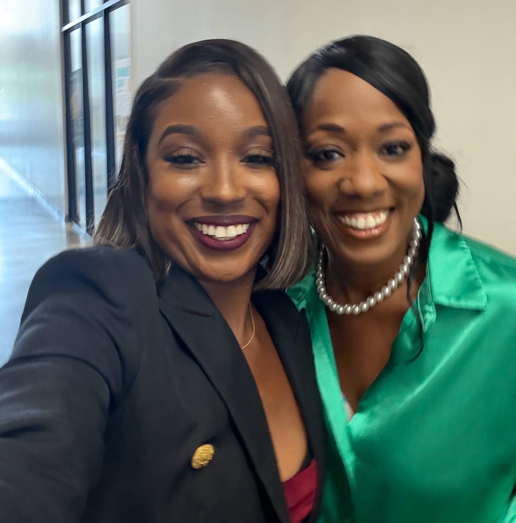 Ashley with a client smiling for a candid portrait