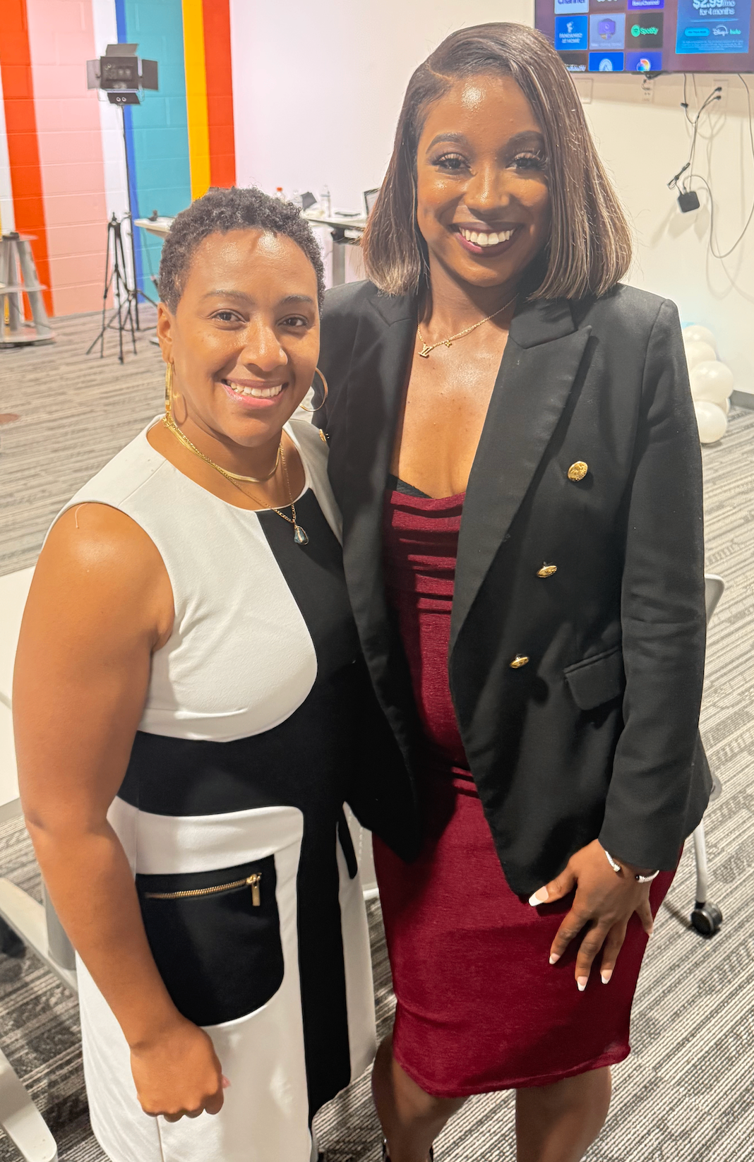 Ashley with a client at a media studio event
