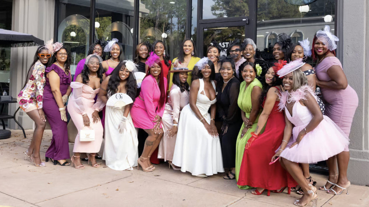 Ashley with clients and business owners at a signature event