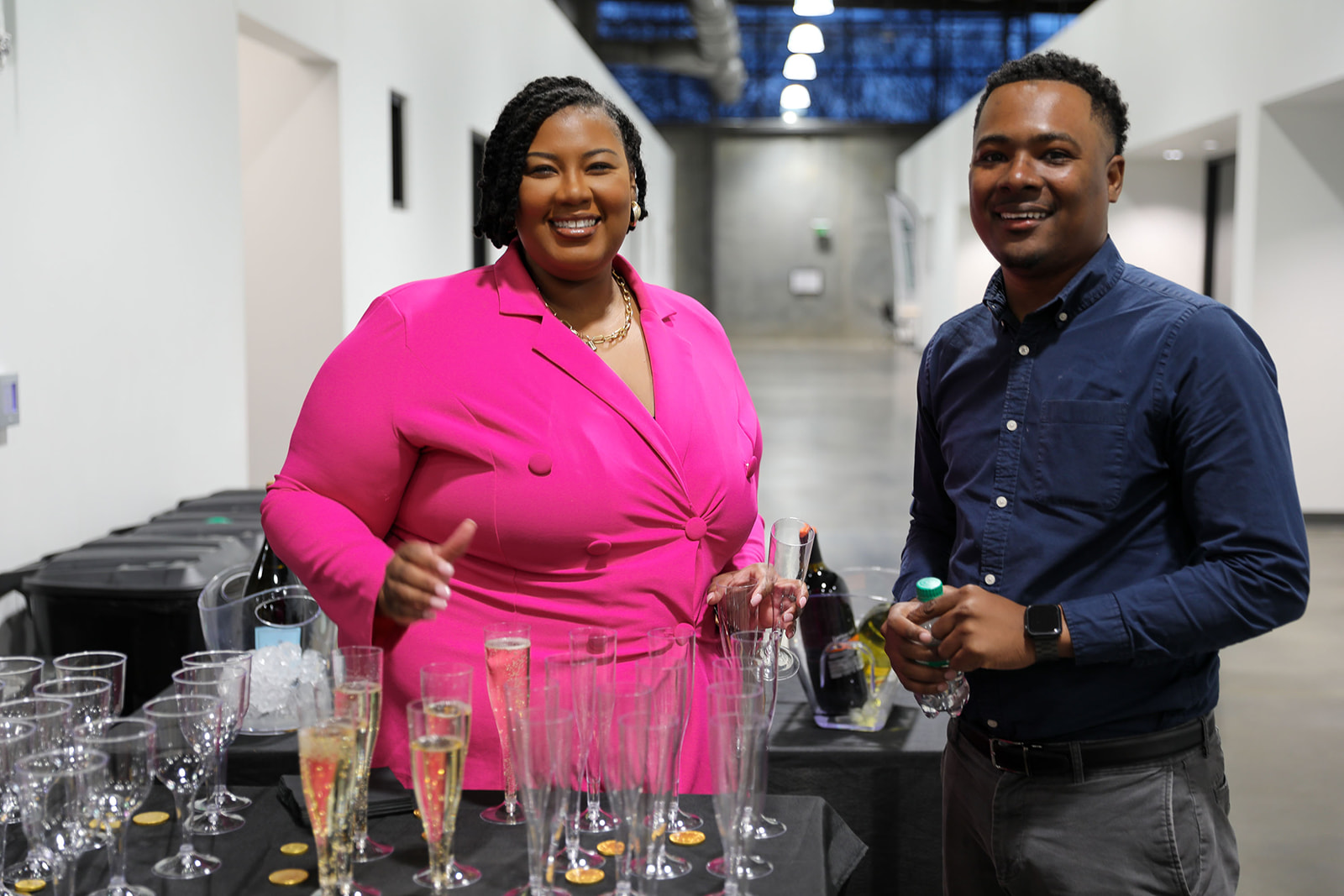 Ashley and partner hosting a business networking event