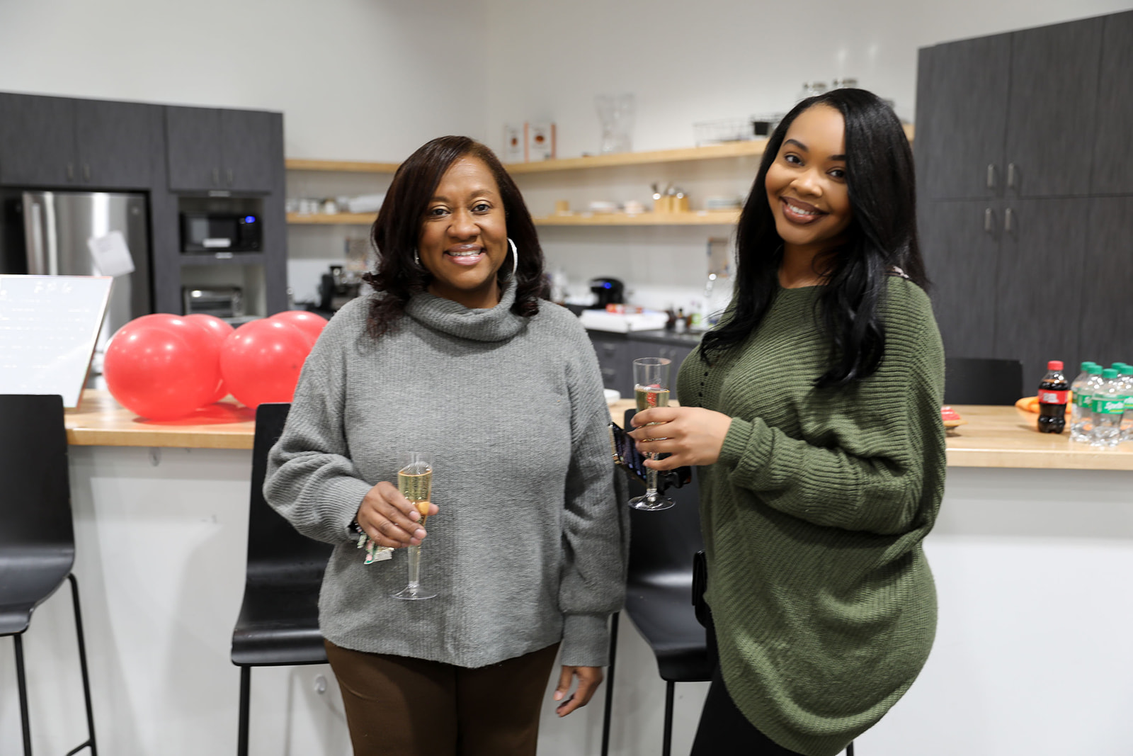 Clients celebrating at a Modish Marketing Studio event